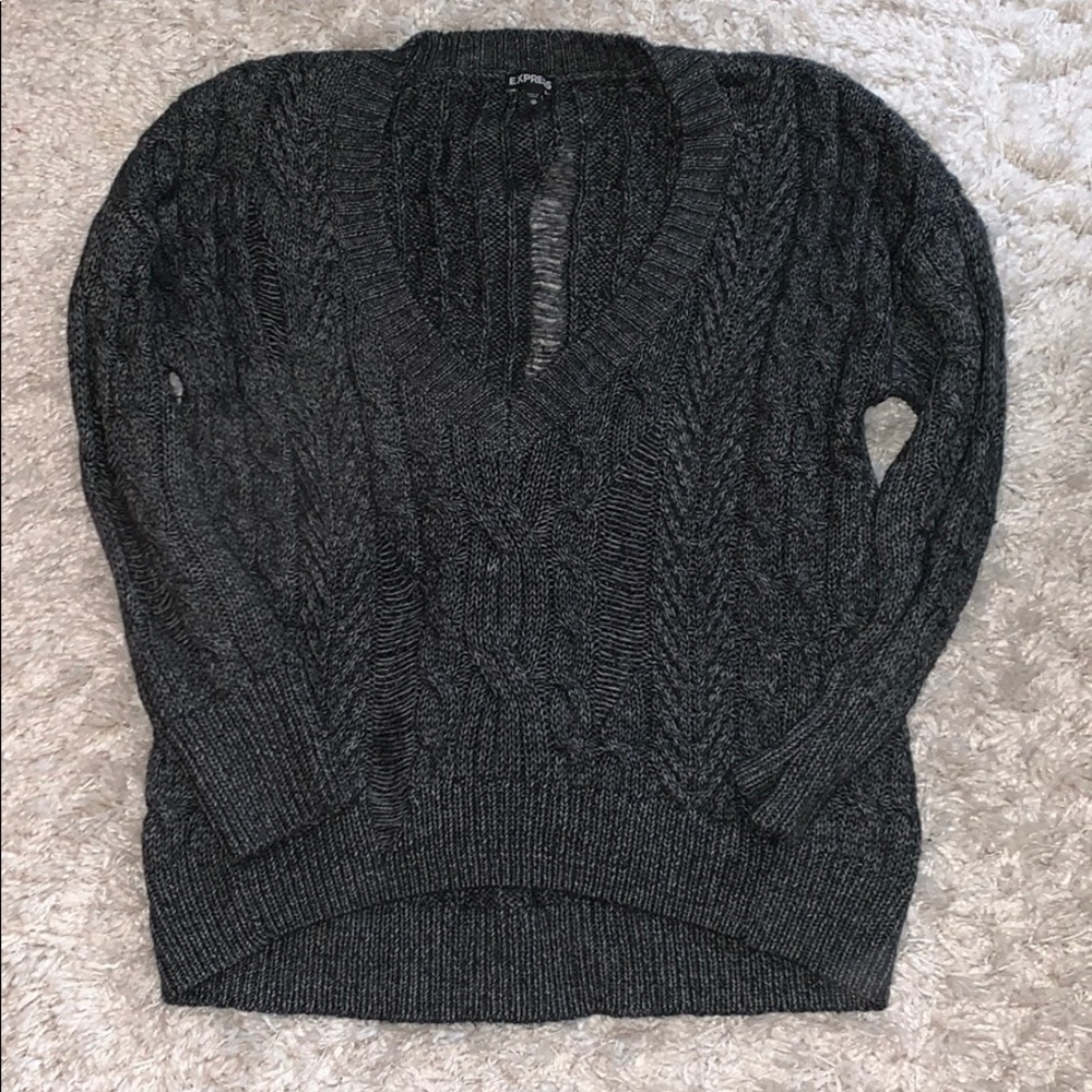 Oversized cable knit distressed sweater
